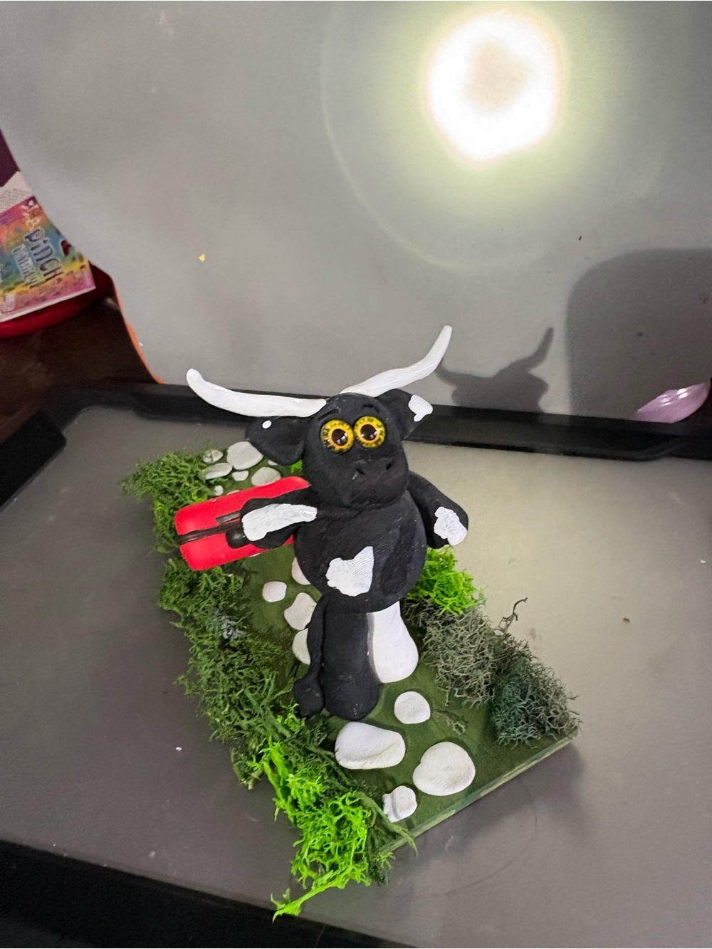 Handmade Black & White Cow Figurine with Red suitcase